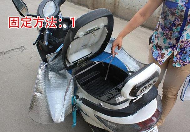 台铃电动车怎么打开坐垫箱截图